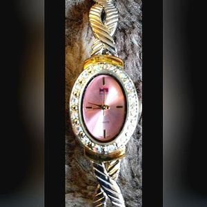 Bugle Boy woman's 2-tone bangle watch